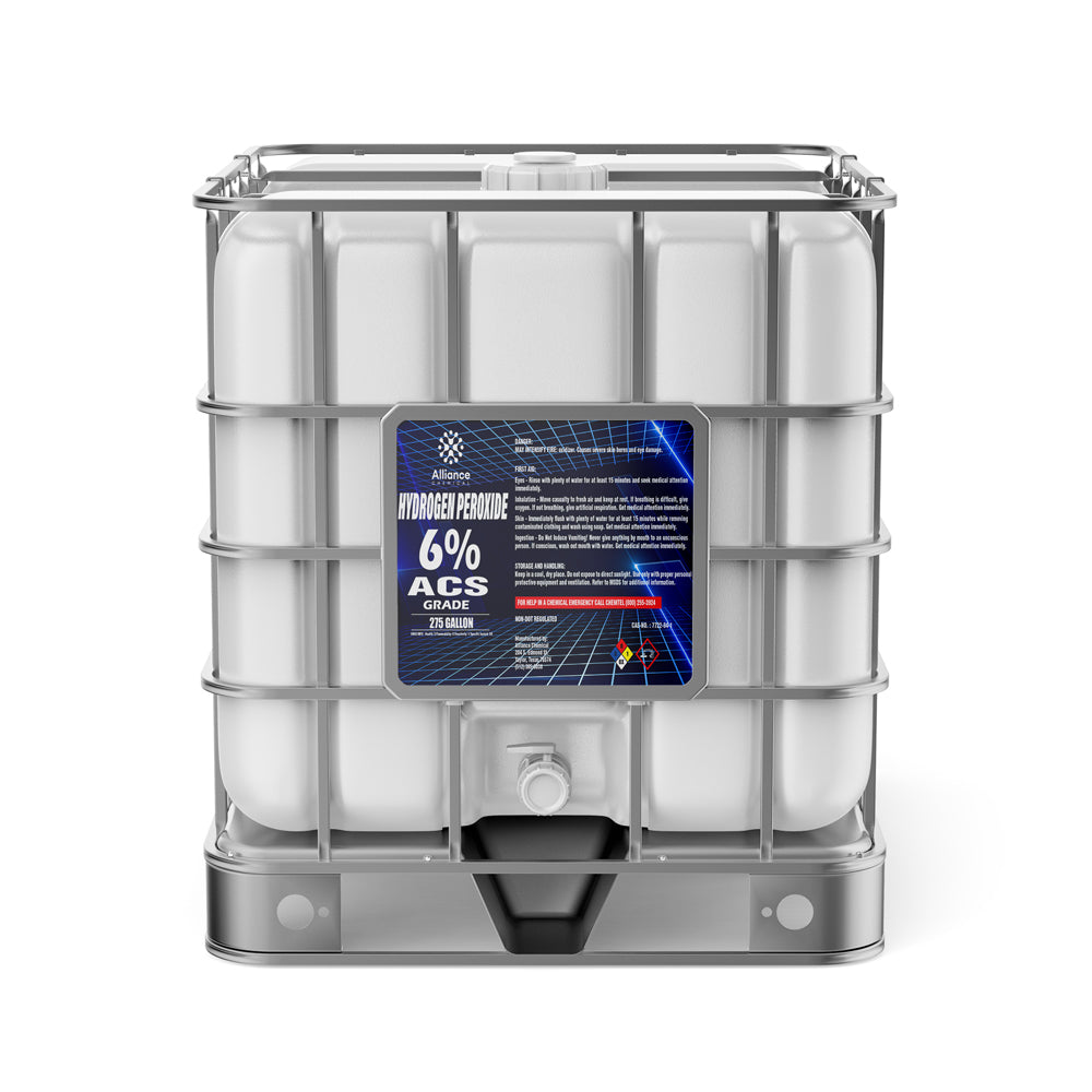 275-gallon IBC tote of 6% ACS-grade hydrogen peroxide in white container with NFPA diamond, industrial safety labeling, and integrated metal cage frame.